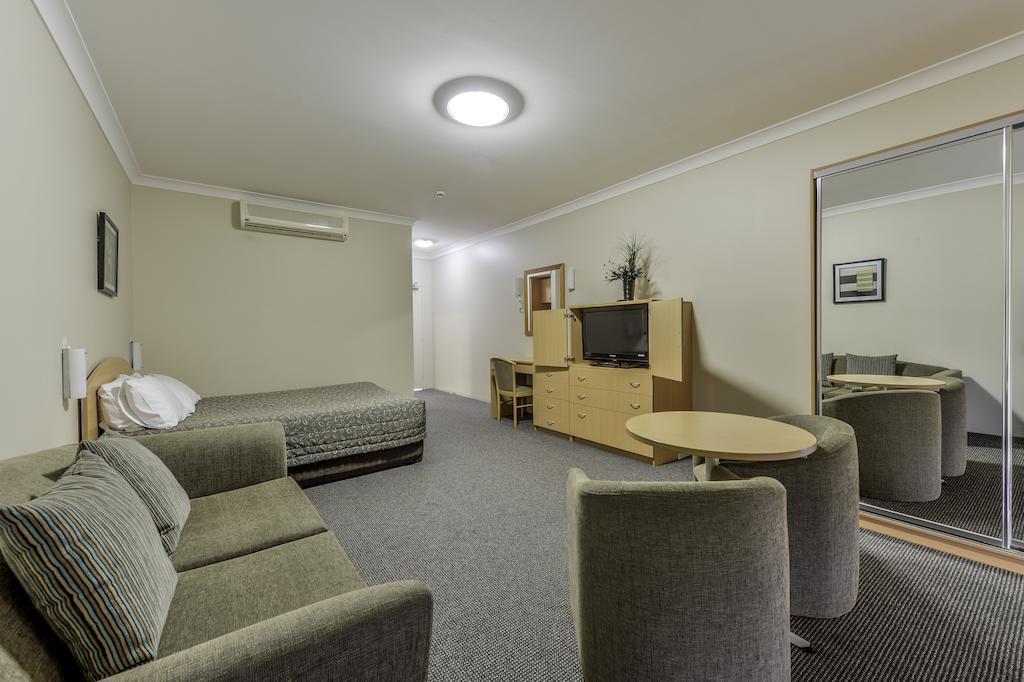 טאמוורת' Golden Guitar Motor Inn חדר תמונה